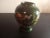 This is a Japanese Emerald Green Moriage Round Bud Vase. Procured at an auction.