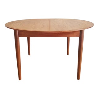 Danish Round Teak Table with Internal Extension, 1960s For Sale