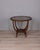 Round coffee table, with wooden frame and smoked glass top, Italian design, 1950s.