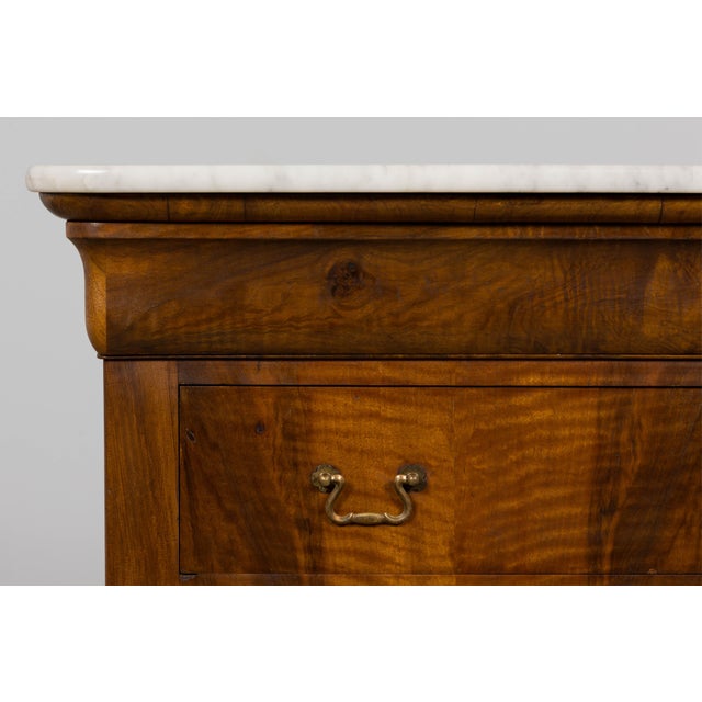 Handsome French Louis Philippe commode, mid-19th century, sourced in Provence, France. The chest features three full-width...