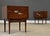 A pair of mid century modern walnut two drawer nightstands with aluminum x inlay and off set aluminum pulls designed by...