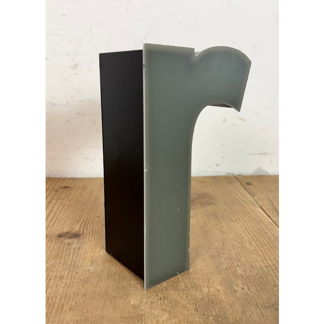 This vintage industrial illuminated letter “ r “ was made in Germany during the 1970s and comes from an old advertising...