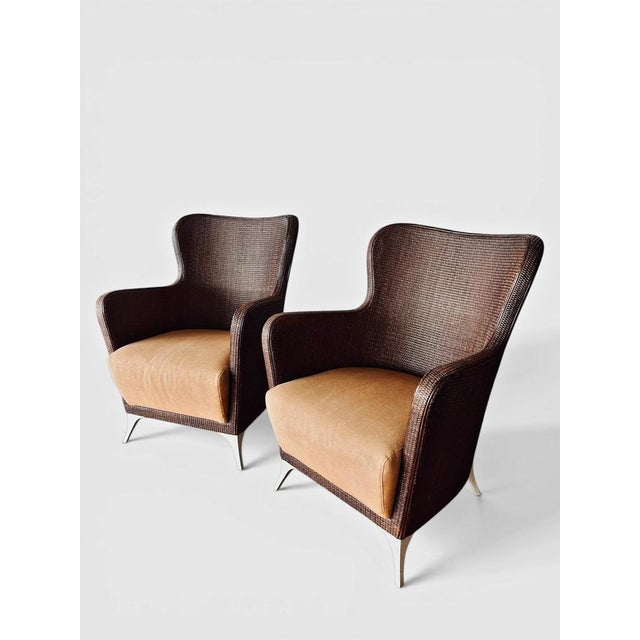 Splendid pair of rattan armchairs by BBB Bonacina, high end italian quality chairs. Very comfortable This piece has an...