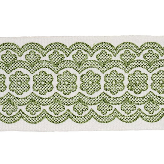 A riff on classic Swedish design, Astrid Embroidered Tape features a sweet floral scroll of openwork embroidery...