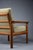 Gorgeous solid teak wood armchair designed and produced in Denmark in the 1960's. This stylish and comfortable piece is in...