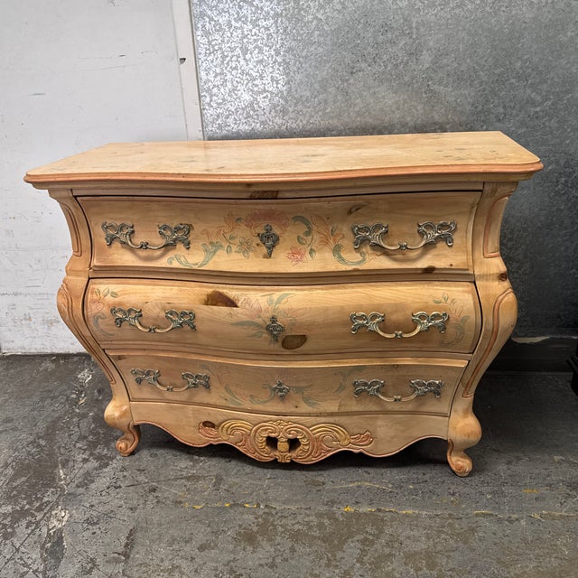Design Plus Gallery presents a Bombe Chest of Drawers from Pulaski Furniture. Constructed from solid pine wood, the chest...