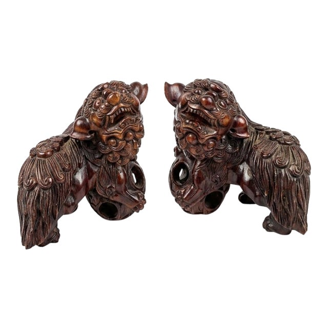 Mid 20th Century Pair of Chinese Carved Hardwood Foo Dogs For Sale