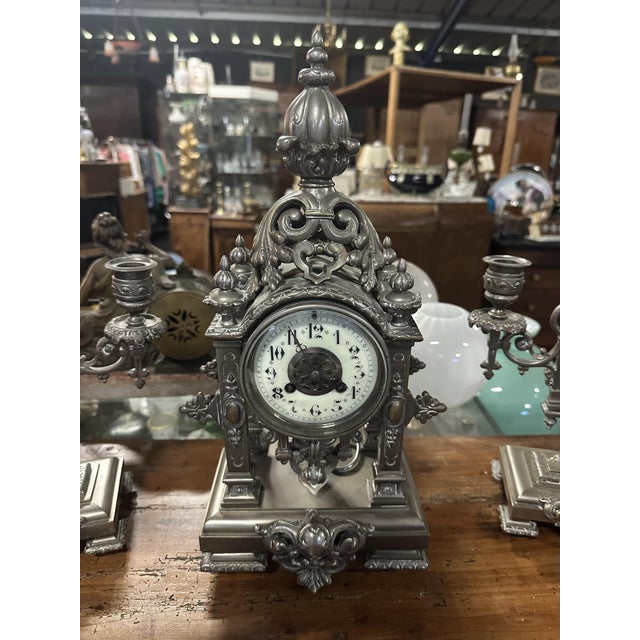 Napoleon III Clock in Silver-Plated Bronze with Candelabras, Set of 3, in Very Good conditions. Designed before 1890
