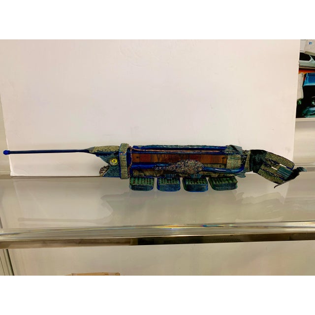 A 1996 Folk Art sculpture by the noted Outsider Artist Norman Scott "Butch" Quinn titled Paddle Fish. The piece is titled...