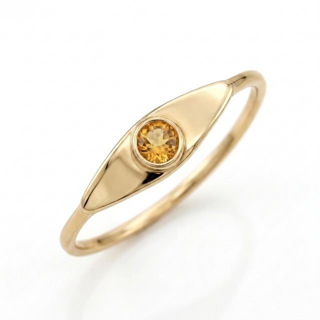 Infuse your everyday jewelry collection with warm golden light. This sleek signet ring showcases a sparkling 3mm Citrine...