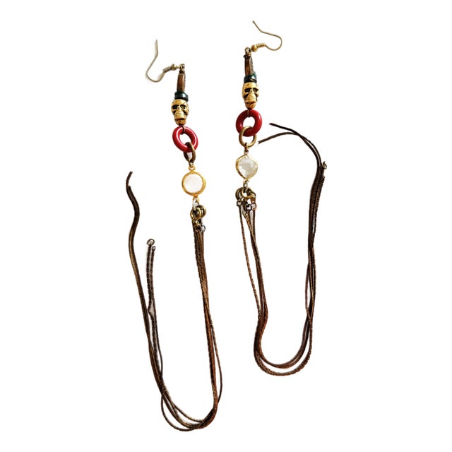Vintage 1990s Gothic Tribal Brass Skull Shoulder Duster Earrings, Pair For Sale