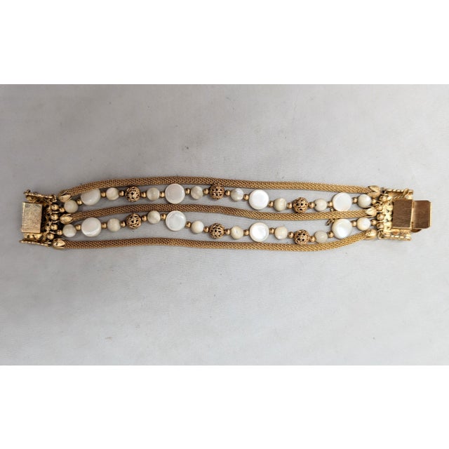 Gold Vintage 1960s Signed Napier 5-Strand Mother-of-Pearl Beaded Bracelet For Sale - Image 8 of 10