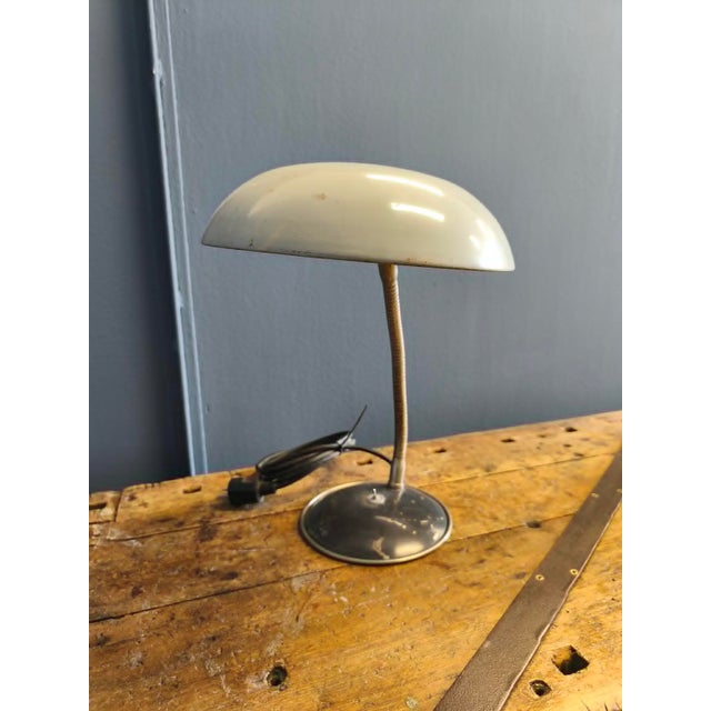 The lamp has a slight patina, I would recommend it for a vintage environment, but it can be nicely renovated if desired....