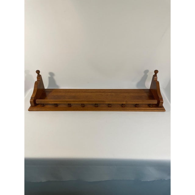 A beautiful Maple Wood Wall Display or Plate Rack Shelf by Ethan Allen from the 1980s. Made by the prestigious Ethan Allen...
