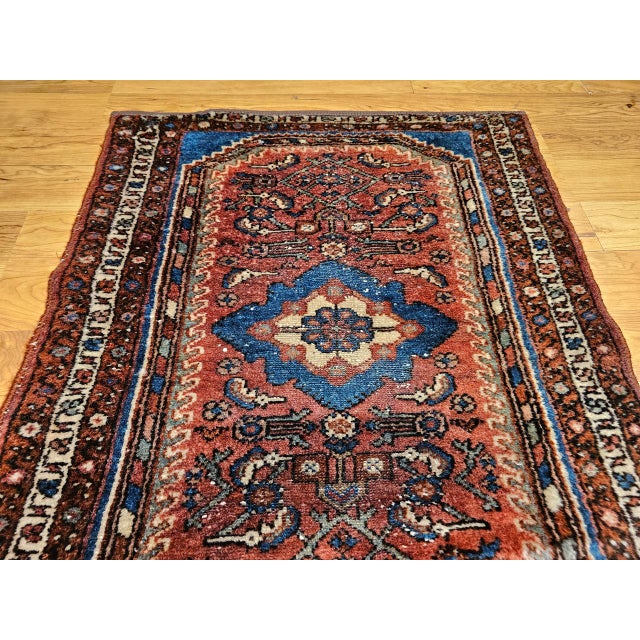 "This vintage Persian Malayer area rug from the second quarter of the 20th century is a timeless example of traditional...