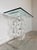 This stunning 1980s modern console table is a true testament to the era’s bold, innovative design. The table features a...