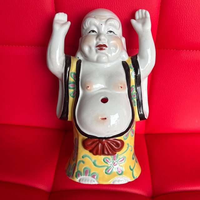 I think he is called the happy Buddha great decorative item and nice size