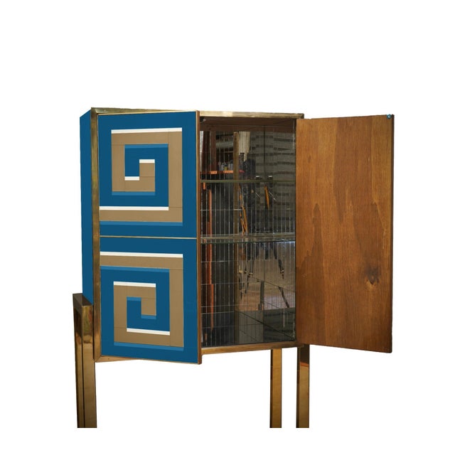 Murano Glass Cabinet with a 3D Optical Effect in blue and gold, a masterpiece of modern craftsmanship that combines the...