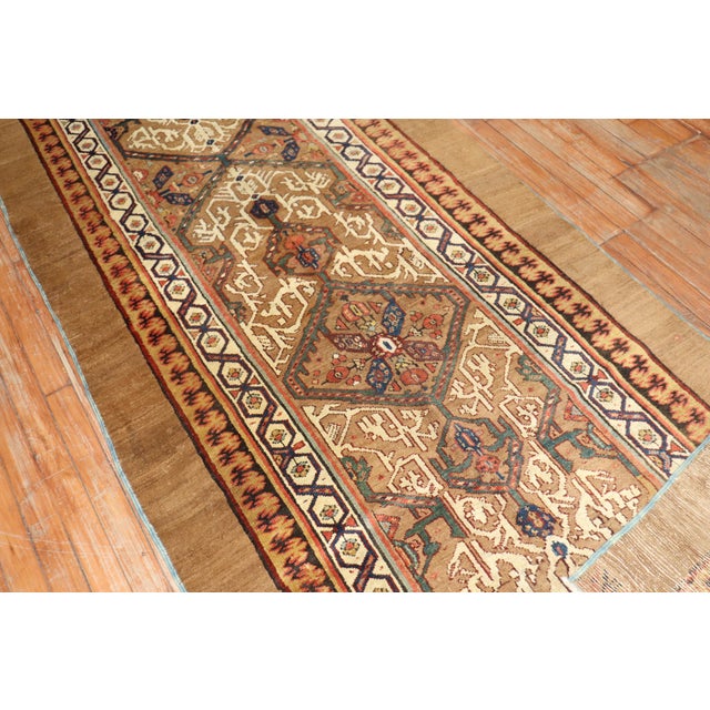 A late 19th century tribal highly decorative Persian Bakshaish Camel Hair runner. Great quality and great condition....