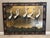 A striking vintage 4-panel Chinese export Coromandel-style screen featuring a dramatic and richly rendered scene of...