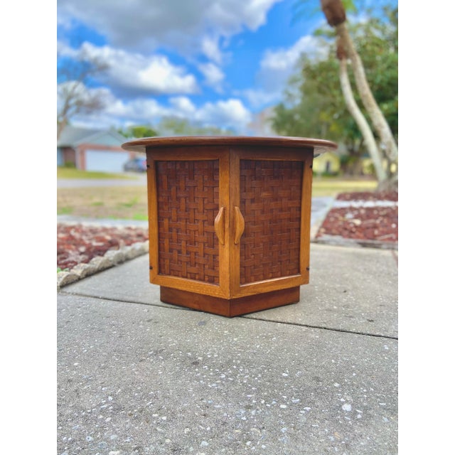Lane Perception Side Table. Basketweave Door Fronts With Hexagon Cubby Storage. Double doors open to a cubby space. Table...