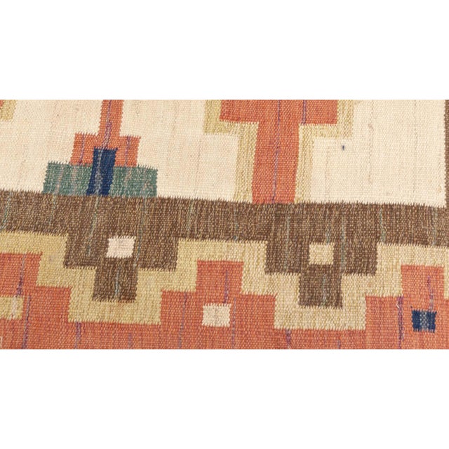 Vintage Swedish flat weave rug signed by (GK) Size: 5'6" × 8'0" (167 × 243 cm) Color: beige, blue, brown, green, pink. A...