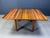 Gorgeous wooden dining table by Molteni in the style of Tobia Scarpa. Greta looking wooden top with 4 sturdy legs. The...
