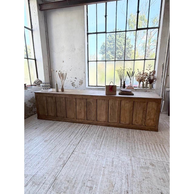 Antique 1950s pine trade or shop counter, measuring an extra-large 3.5 meters. formerly in a fabric shop, it bears the...