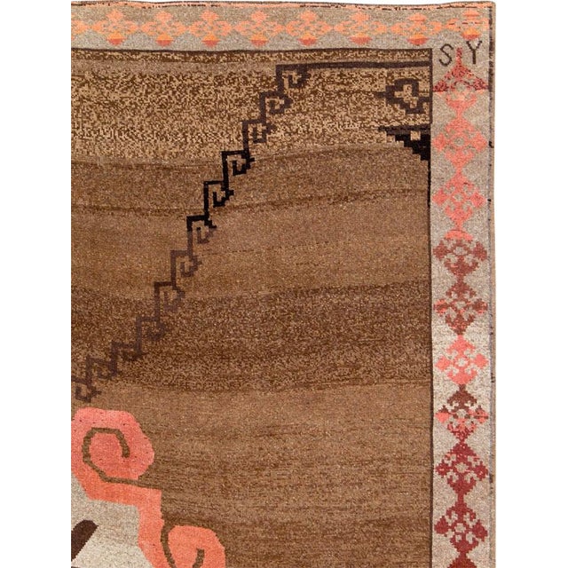 A vintage Turkish Anatolian carpet from the mid-20th century.