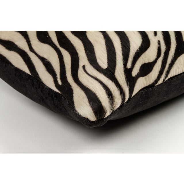 Stenciled Brazilian Cowhide, Black Chenille back, Fiber insert This pillow is made using unique cowhides, with no two...