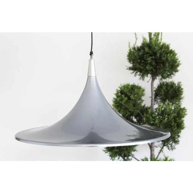 Pair of ceiling chandeliers Goffredo Reggiani, Italy 1980s, metallic gray, height and adjustable through the wires that...