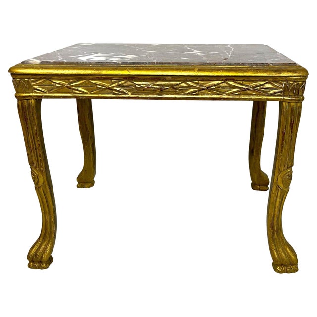 Highly decorative small Louis XV style gilt side table with grey marble top, carved legs ending in paw feet with extensive...