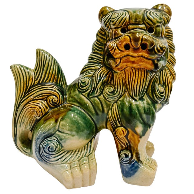A beautiful pair of vintage glazed ceramic blue and green foo dogs. These usually come in a smaller size, most often 5" or...