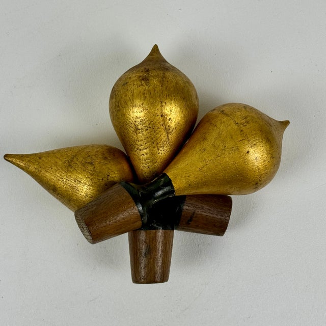 A unique set of 3 vintage gilded wooden stoppers with different dome shapes. What these were originally used for is...