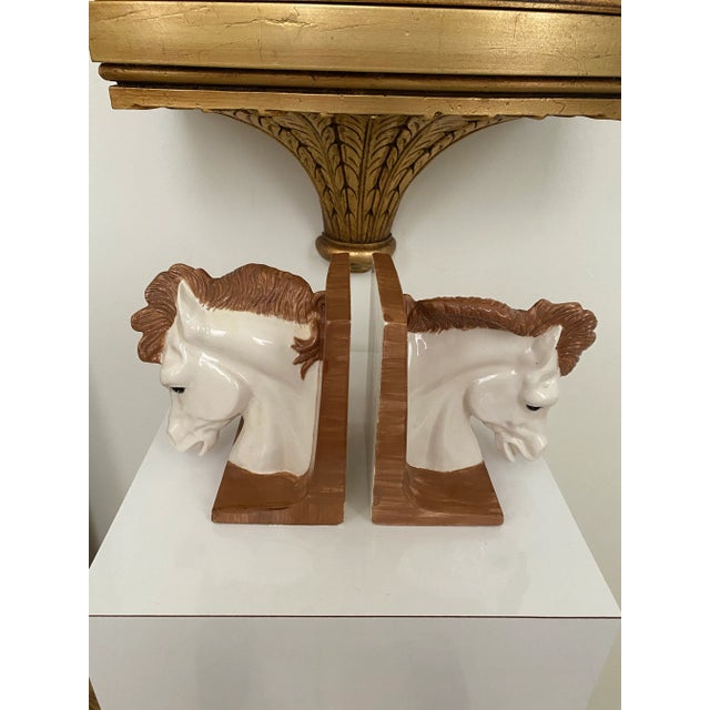 Add a striking equestrian touch to your bookshelf or mantel with this handsome pair of vintage horse head bookends. Made...
