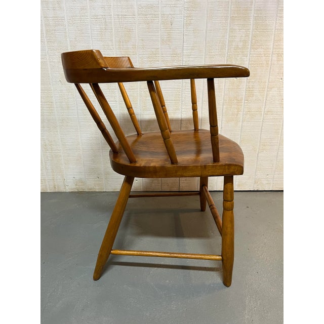 This antique wooden pub chair is full of character! It is made from mixed woods has a doweled construction with square...