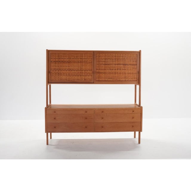 RY20 Double Cabinet by Hans J. Wegner for Ry Møbler, 1960s, in Very Good conditions. Designed 1950 to 1959 This piece has...