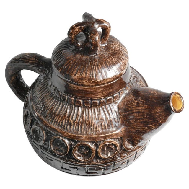 This playful and unique teapot, has different sides to it. Sometimes it looks like just a quirky tea pot with a bright...