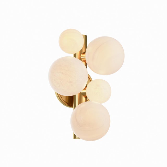 Echoing the sculptural beauty of the Styx Collection, this sconce adds an elegant and modern touch to any space. Its glass...