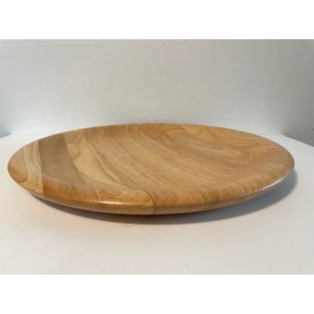 A simple and minimal blonde wood platter by Dansk, Thailand. The platter is made of solid wood.