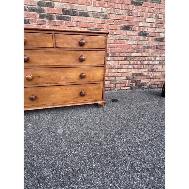 This is a lovely antique pine chest! This piece dates to the 19th century and has lovely patina. The wood has a warm glow,...