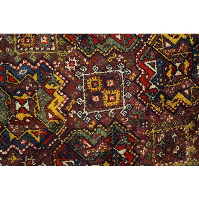 Wine Antique Persian Quchan Rug For Sale - Image 8 of 9