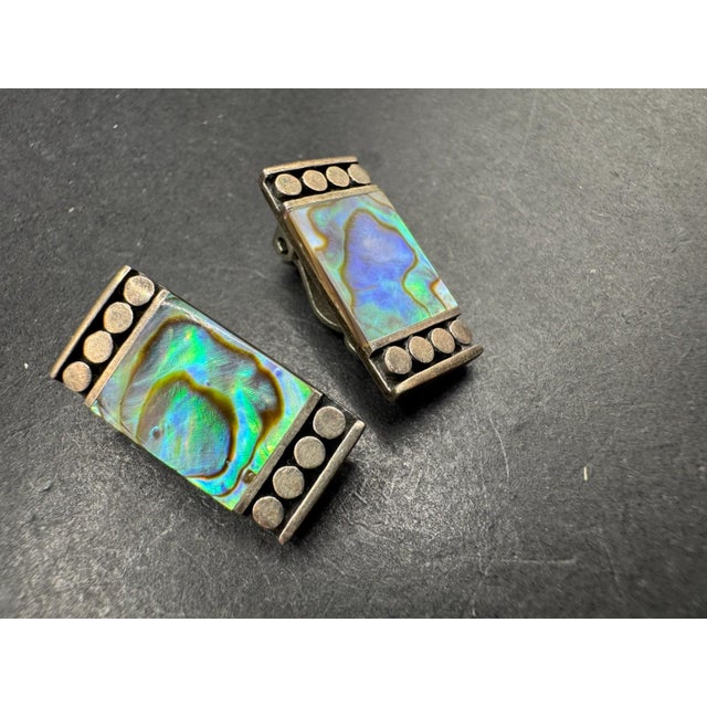 This lovely pair of 1950s Native American Abalone Sterling Clip On Earrings will look amazing anytime of the day or night....