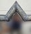 A vintage handmade Moroccan mirror featuring a striking star‑shaped metal frame with traditional engraved motifs blending...