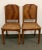 Pair of finely crafted French Art Deco side / dinning room chairs. The tops are decorated with booked matched walnut...