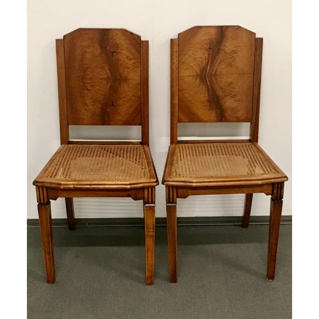 The top of the chair is decorated with booked matched walnut veneers. .The chair frame was completely taken apart and...