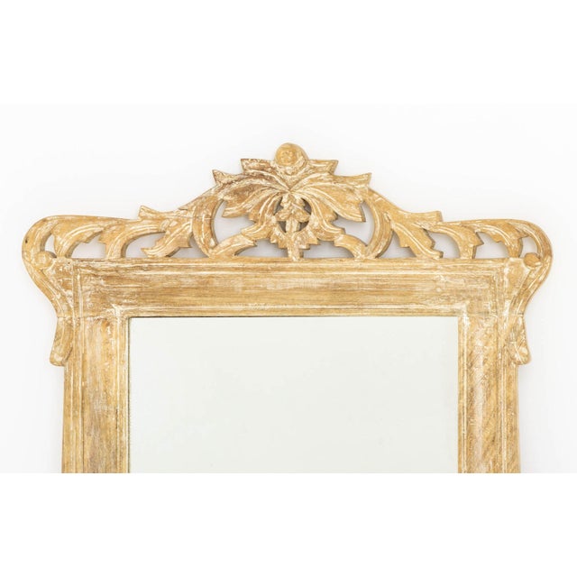 Louis XV Style Carved Wood Framed Mirror, the cresting with foliate motif. Looking glass: 22.5" H x 16" W; frame: 34" H x...