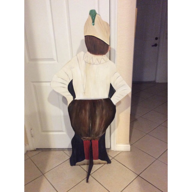 Charming freestanding “Jester” figure painted on wood. He is whimsical and will lead to lots of fun conversation. He can...