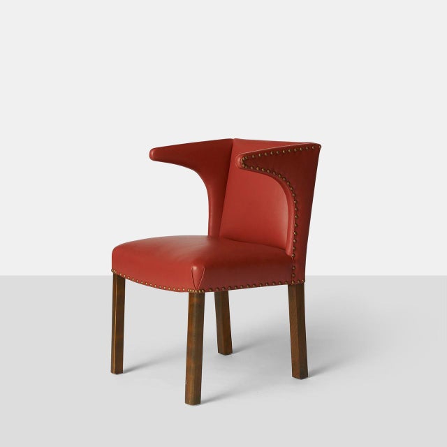 Lounge Chair by Fritz Henningsen Denmark, circa 1930s A rare leather and mahogany easy chair with a nail head trim....