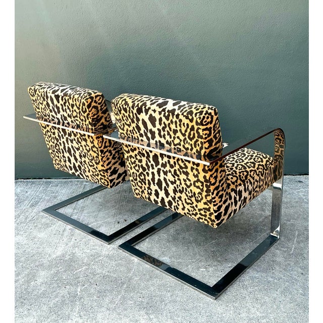 This striking pair of armchairs by Ralph Lauren epitomizes high-octane Hollywood Regency glamour. Featuring sleek,...